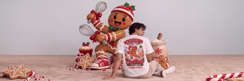 Mann im Studio neben einer riesigen Lebkuchenmann-Figur, Rückendruck Whisking away the Christmas Calories